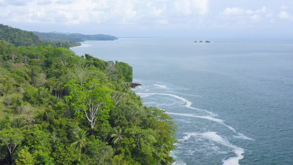 Aerial Drone View of Rainforest and Ocean on the Pacific Coast in Costa Rica, Tropical Jungle Coasta