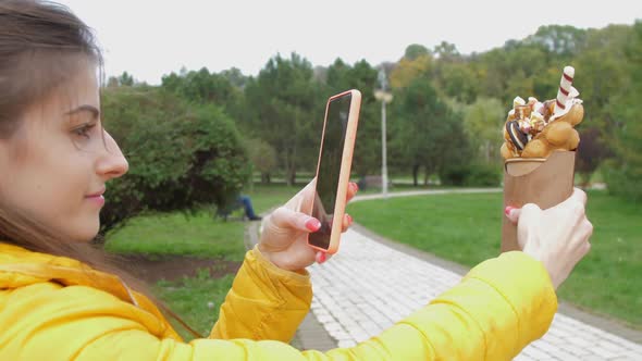 Woman Takes Photo of Delicious in Korean Wafer with Cream