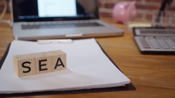 Job Search  Words with Wooden Cubes Which Man Spread Out on Table