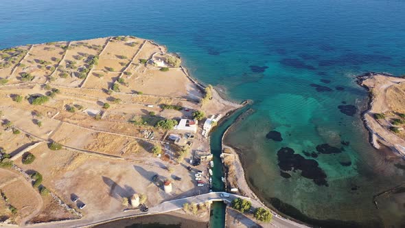 Aerial View of a Motor Boat in a Deep Blue Colored Sea. Kolokitha Island, Crete, Greece