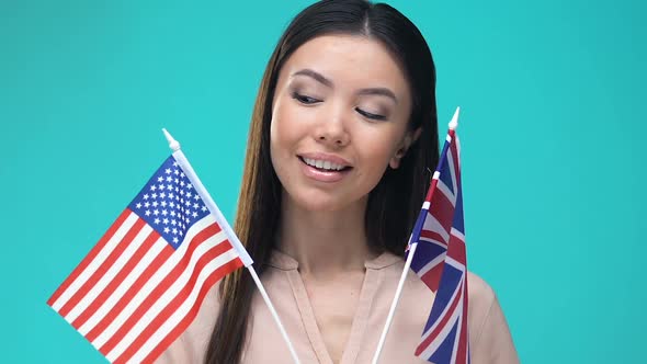 Pretty Lady Holding American and British Flags in Hands, Foreign Language School