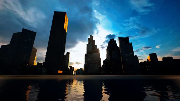 Skyline with Skyscrapers and Sea at Sunset