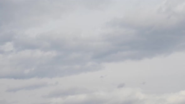 Cloud time lapse on spring season with rapid cloud formation alt