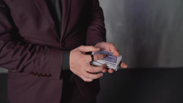 Young Boy in Magician Costume with Cards