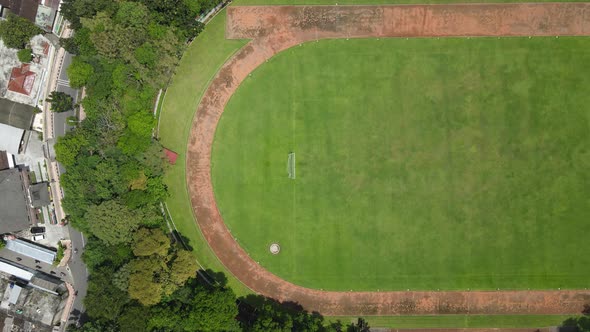Top aerial view of traditional soccer field in Indonesia