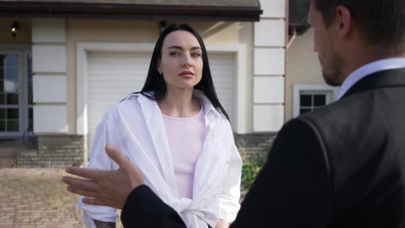 Beautiful Rich Woman Listening to Real Estate Agent Talking Gesturing in Slow Motion