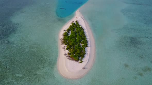 Drone aerial texture of shore beach trip by clear ocean with sand background