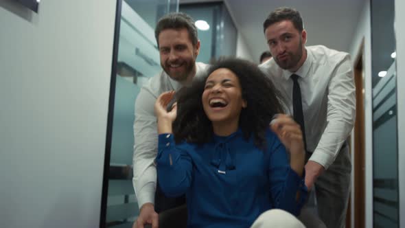 Multiracial Coworkers Team Celebrate Business Deal Race Office Chair in Company