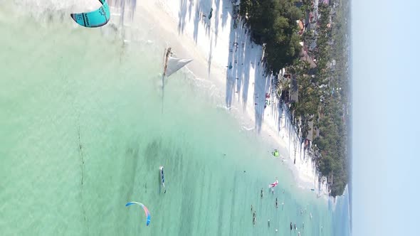 Vertical Video Boats in the Ocean Near the Coast of Zanzibar Tanzania Aerial View