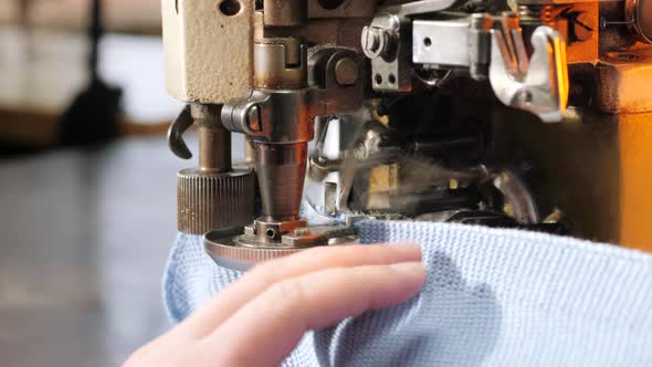 Female Hands Working on Tailoring