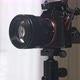 close up zoom out of camera installed on heavy tripod heads. - VideoHive Item for Sale