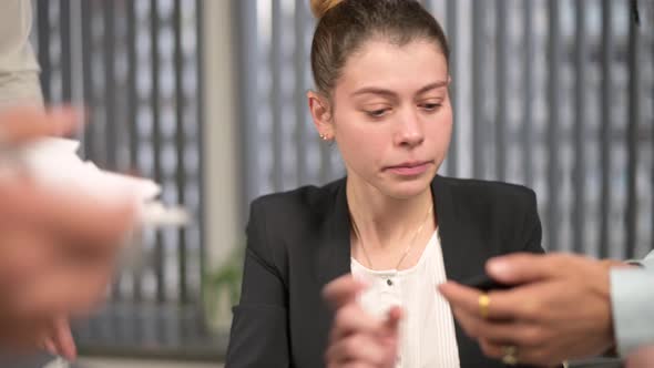 Colleagues and bosses overwhelmed a young woman manager with work