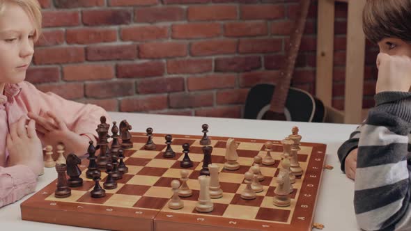 Two Boys Playing Chess