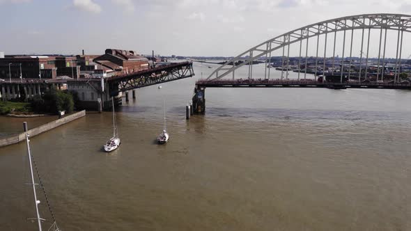 Sailing Boats Floating At North River Waiting For Bascule Bridge To Open In Alblasserdam, Netherland