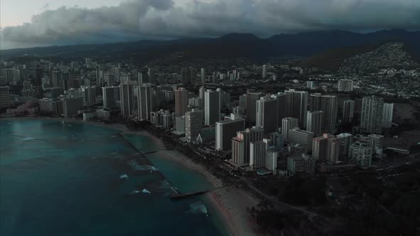 Aerial drone footage of Honolulu, Hawaii. Beautiful real estate, buildings in the city. Palm trees