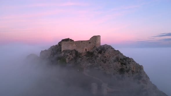 Aerial View of a Medieval Castle in a Beautiful Foggy Sunset Poza De La Sal Burgos Spain