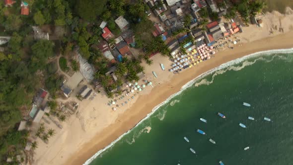 Aerial View Of Scenic Yelapa Beach Near Puerto Vallarta In Jalisco, Mexico In Summer. fast drone orb