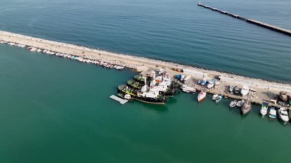 Ship tractor in the port Aerial view 4 K