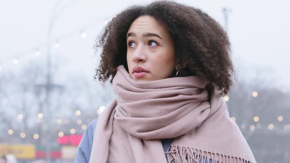 Portrait of Calm Afro American Woman Posing in Front of Camera Looking Away