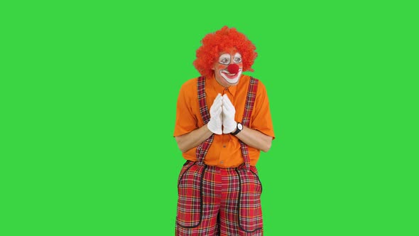 Cunning Clown Thinking Having Some Evil Thoughts on a Green Screen Chroma Key