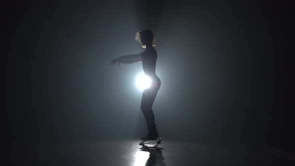 Lady in Sports Suit Doing Exercises in Kangoo Jumps Shoes