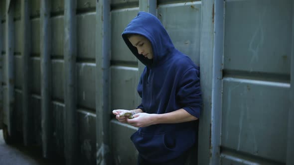 Boy Counting Remaining Money Hiding Outdoors, Escape From Home, Child Abuse