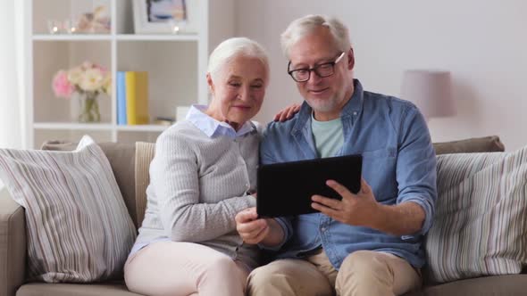 Senior Couple Having Video Call on Tablet Pc