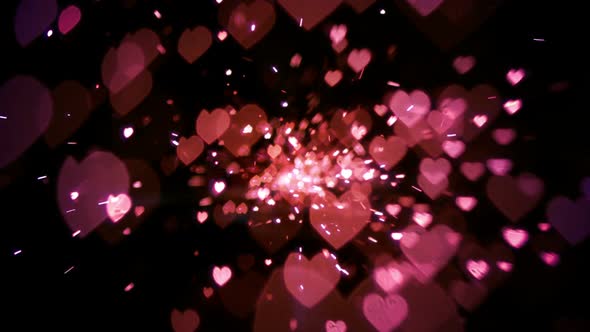 Pink heart confetti and sparks