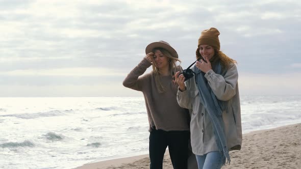 Beautiful Girls Walk Near the Sea