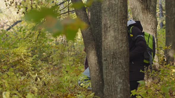 Young Couple People Walking in Forest Travel with Backpack Hiking Guy and Girl Love Adventure Joyful