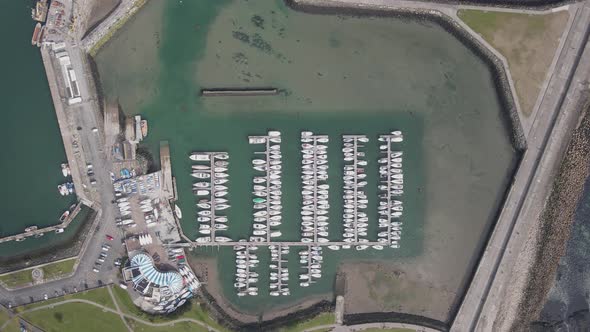 Non functional boats docked at Howth harbour Dublin Ireland