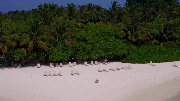 Aerial drone texture of bay beach time by water with sand background