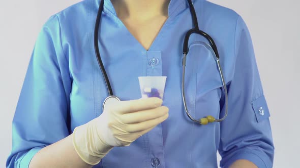 Nurse Giving Medication to Ill Patient, Pain Killers. Healthcare and Medicine