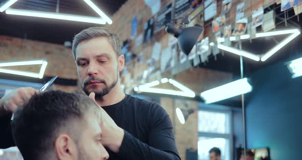 Brutal Barber Cuts a Man's Bang at a Hair Salon