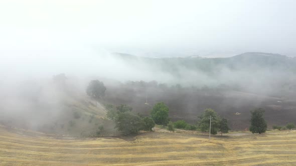 Fog in the countryside over fields and lands in autumn