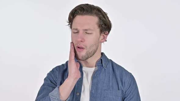 Portrait of Young Man with Toothache on White Background