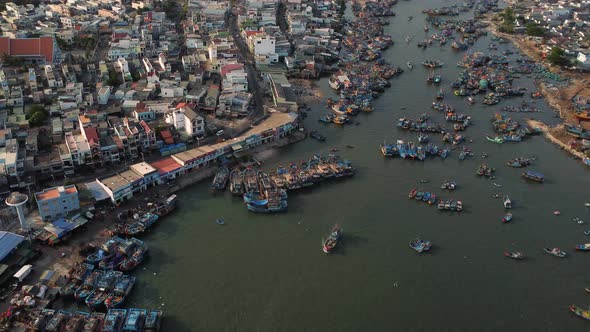 Aerial rising revealing La gi town and coast side, Vietnam