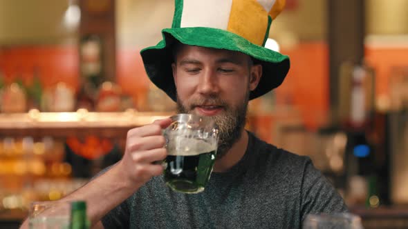 Portrait of man celebrating Saint Patrick's Day at the bar