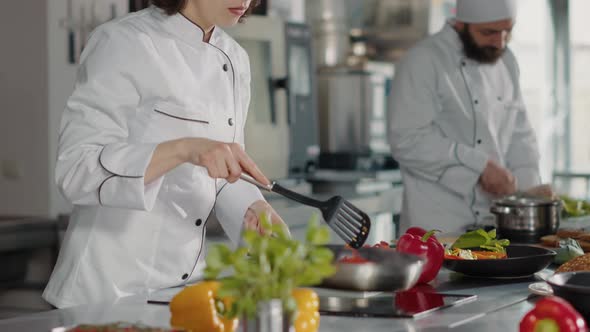 Gourmet Chef Cooking Gastronomic Dish in Frying Pan