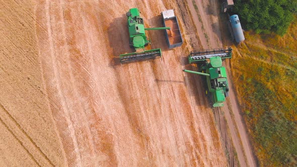  Impressive Flight Over a Working Combine Harvesting Tons of Ripe Barley