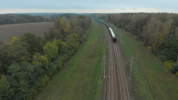 Freight Train on Railway in Countryside