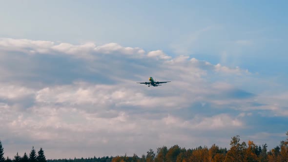 Aircraft Landing, Flying Over The Autumn Forest