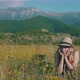 Woman In Wildflower Field - VideoHive Item for Sale
