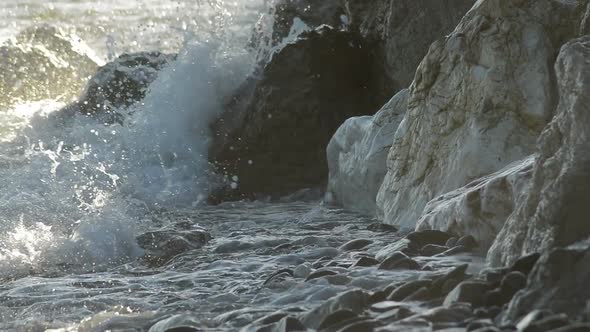 Sea Breaking Against the Rocks at Sunset