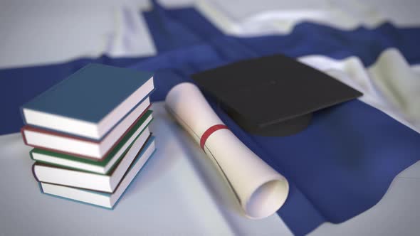 Graduation Cap and Diploma on the Finnish Flag