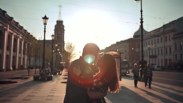 Attractive Male and Young Female Having Fun in the City