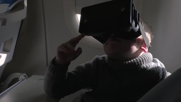 Child Using VR-headset in the Airplane