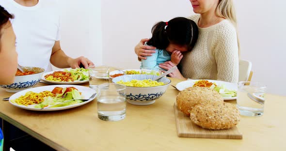 Happy family having meal