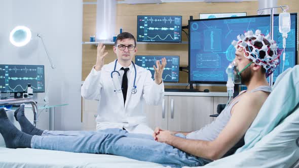 Patient Sitting on a Bed in a Facility for Brain Research