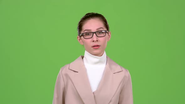 Businesswoman Corrects Glasses and Is Angry with Her Subordinates. Green Screen